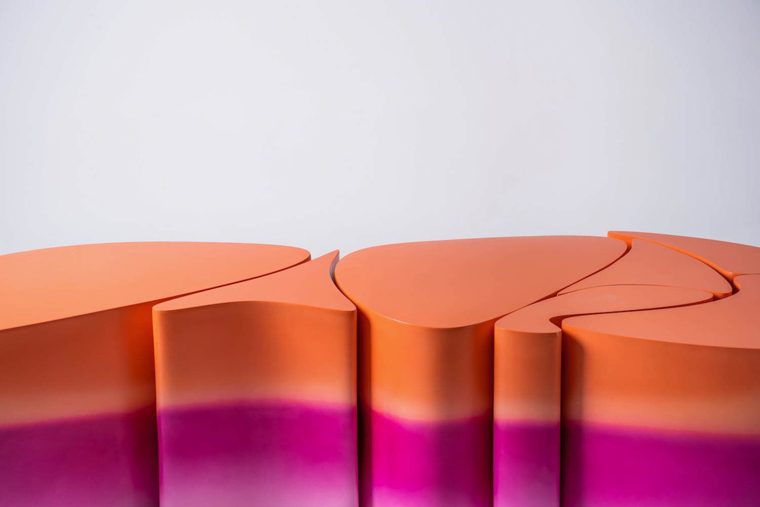 粉红色和橙色梯度小模块凳