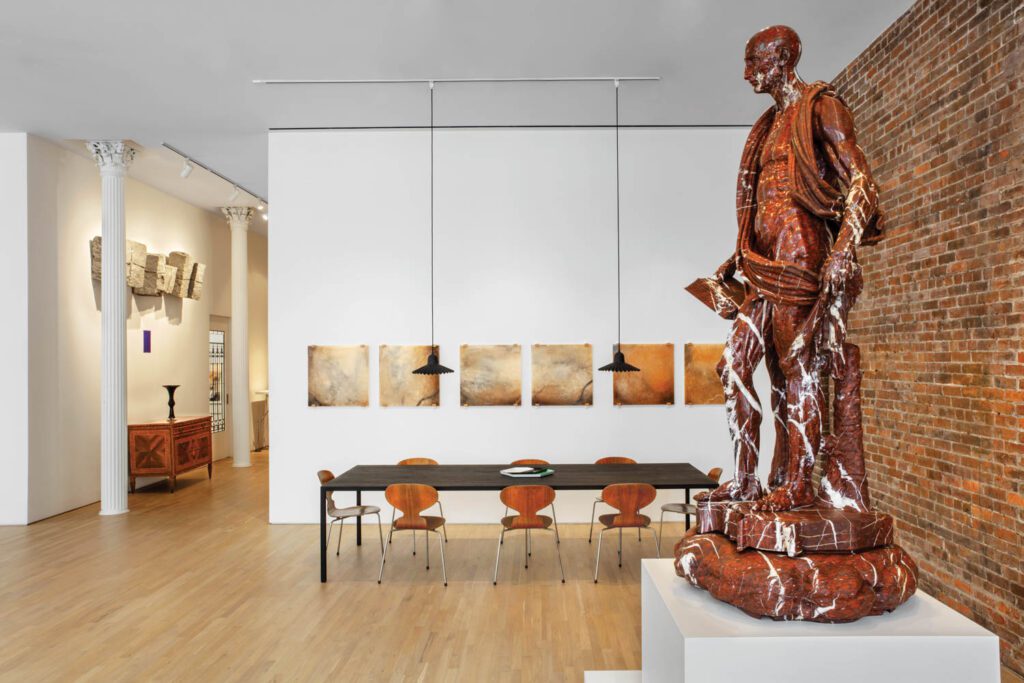 arne Jacobsen轮椅排列餐桌由Piergiorgio和Michele Cazzaniga组成