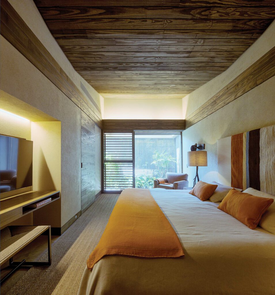 沙板墙、碳化平面板和磨机, 和Hemp地毯为客房带出微薄丰度, Marcelo Magalhaes的树板灯也是如此。