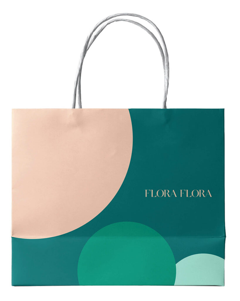 带粉色圆圈带项目标识的Teal图包